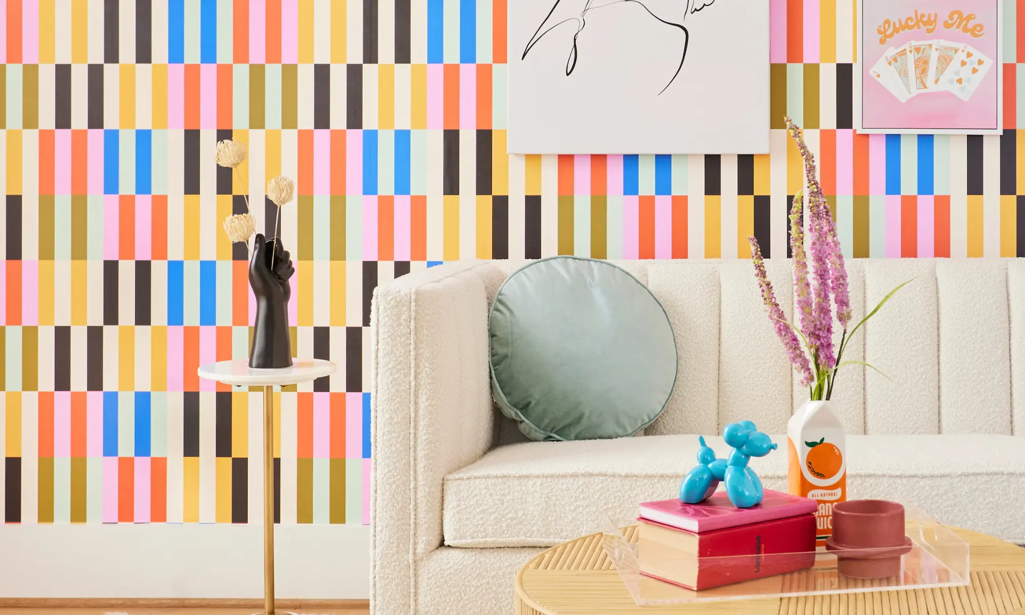 Living room with multi-color peel and stick wallpaper