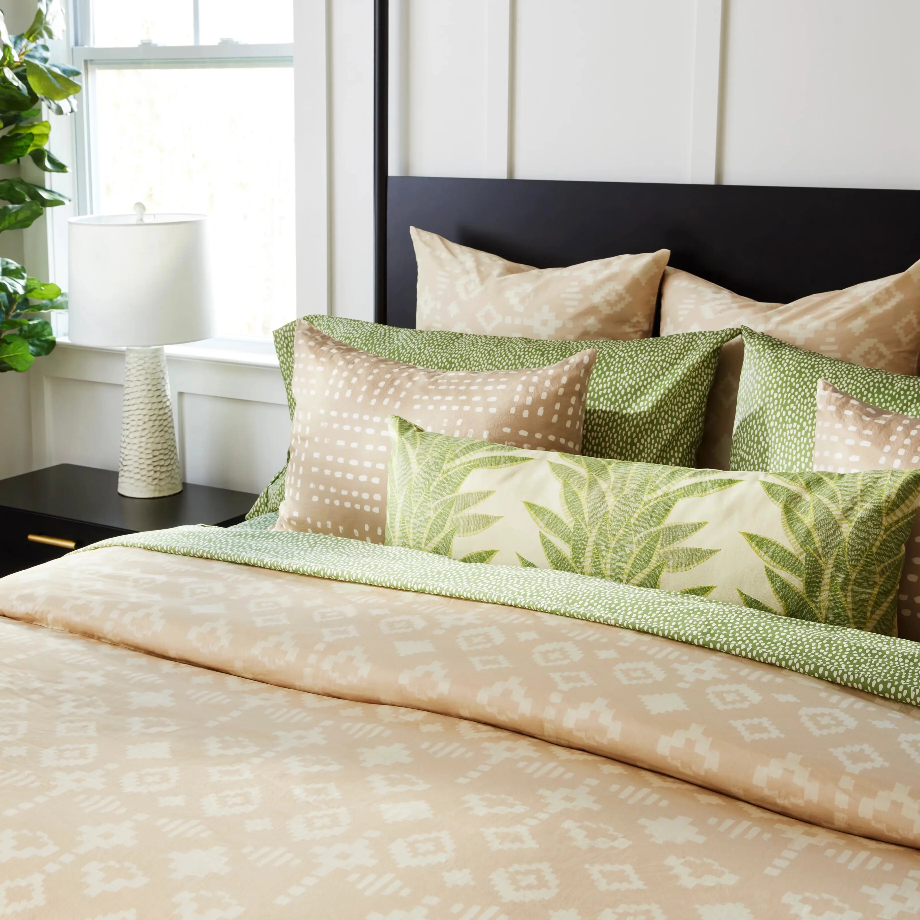 Tan and green Spoonflower bedding.