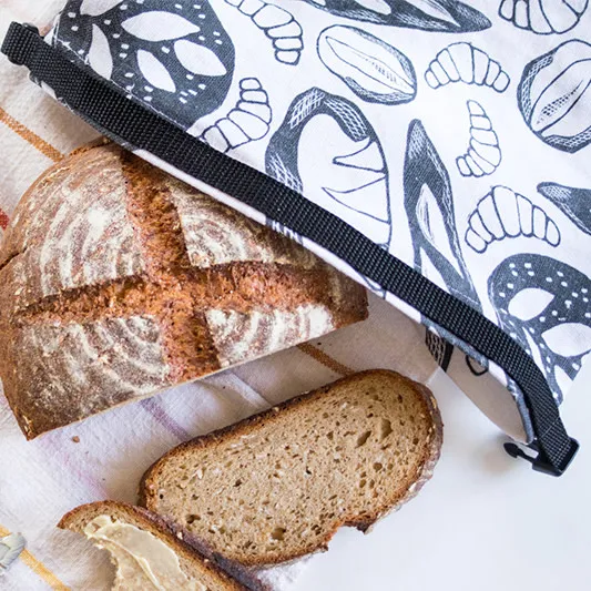Printed bag with a home made loaf of bread.