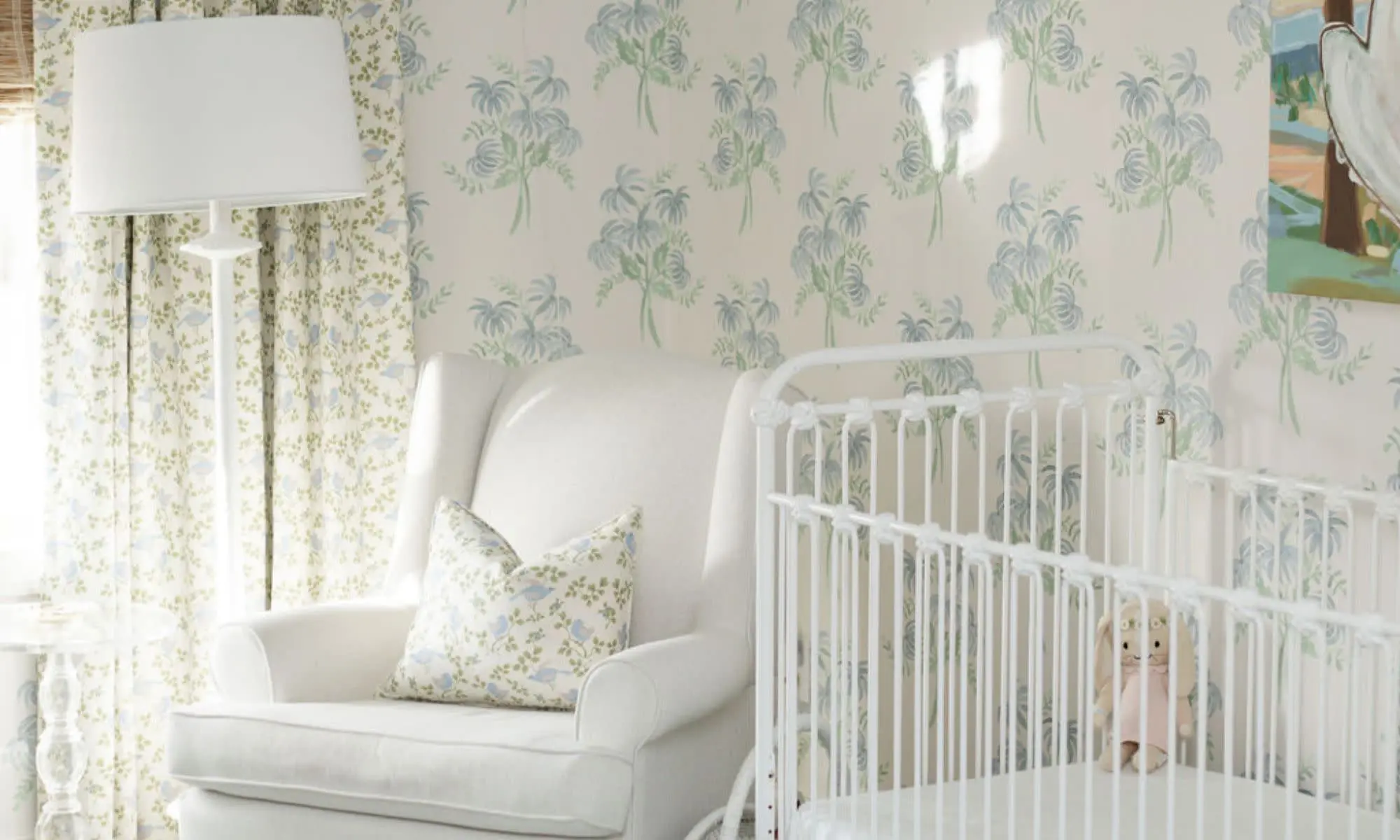 Nursery with floral wallpaper