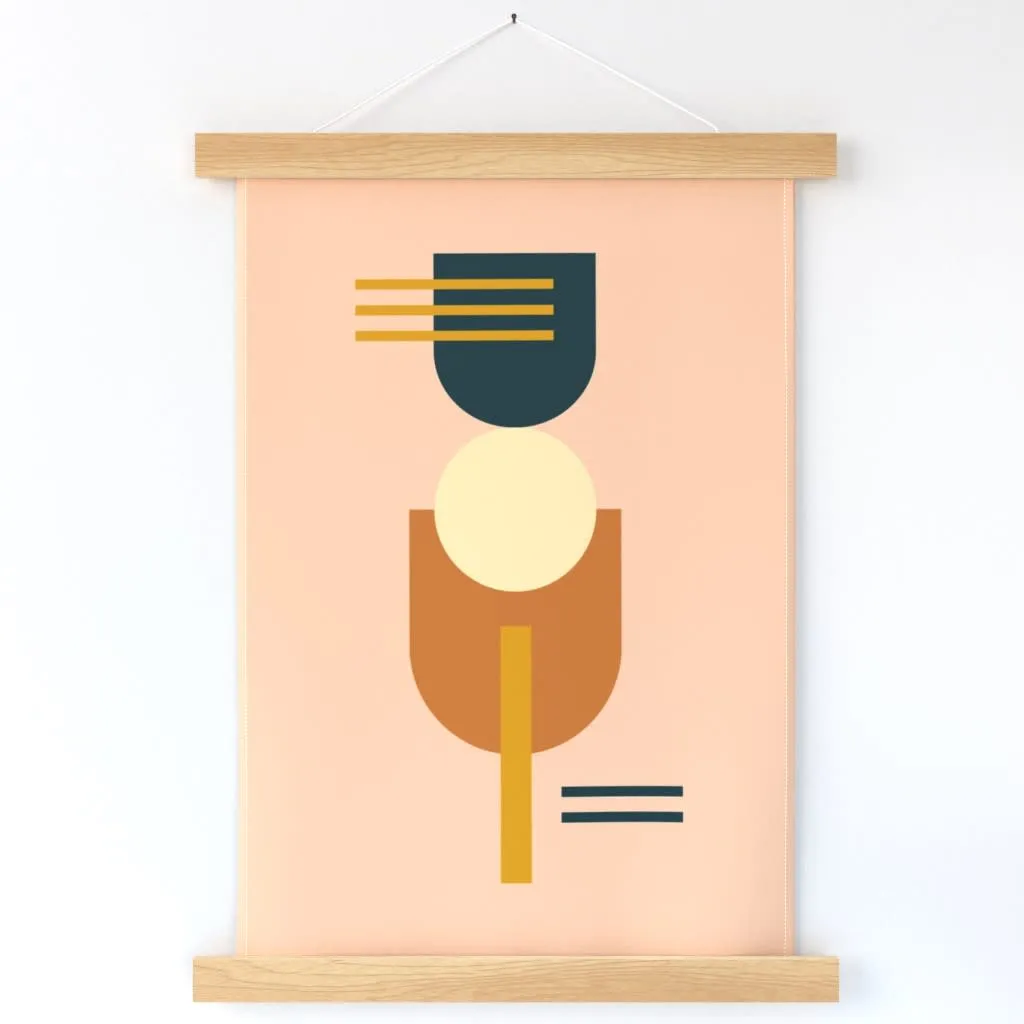 Abstract shapes on pink wall hanging