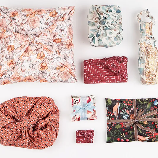 Items wrapped with Spoonflower fabric using the furoshiki technique.