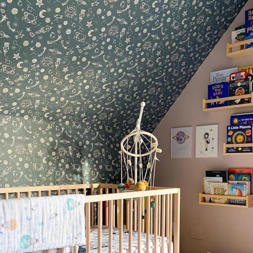 Nursery with Space Themed Wallpaper