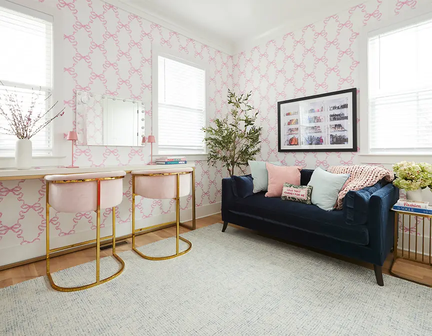 Pink bow wallpaper in a living space.