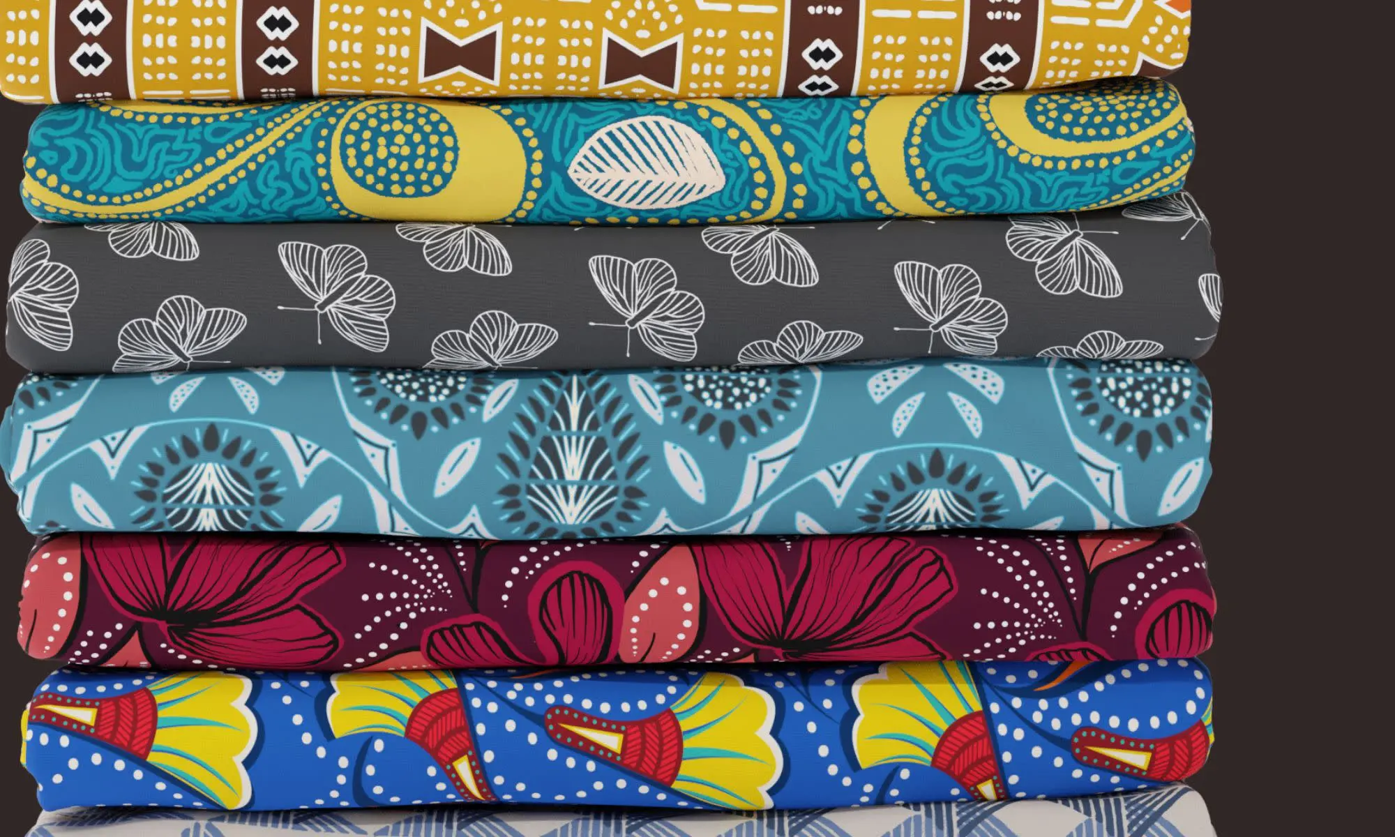 Stack of colorful fabrics on black background
