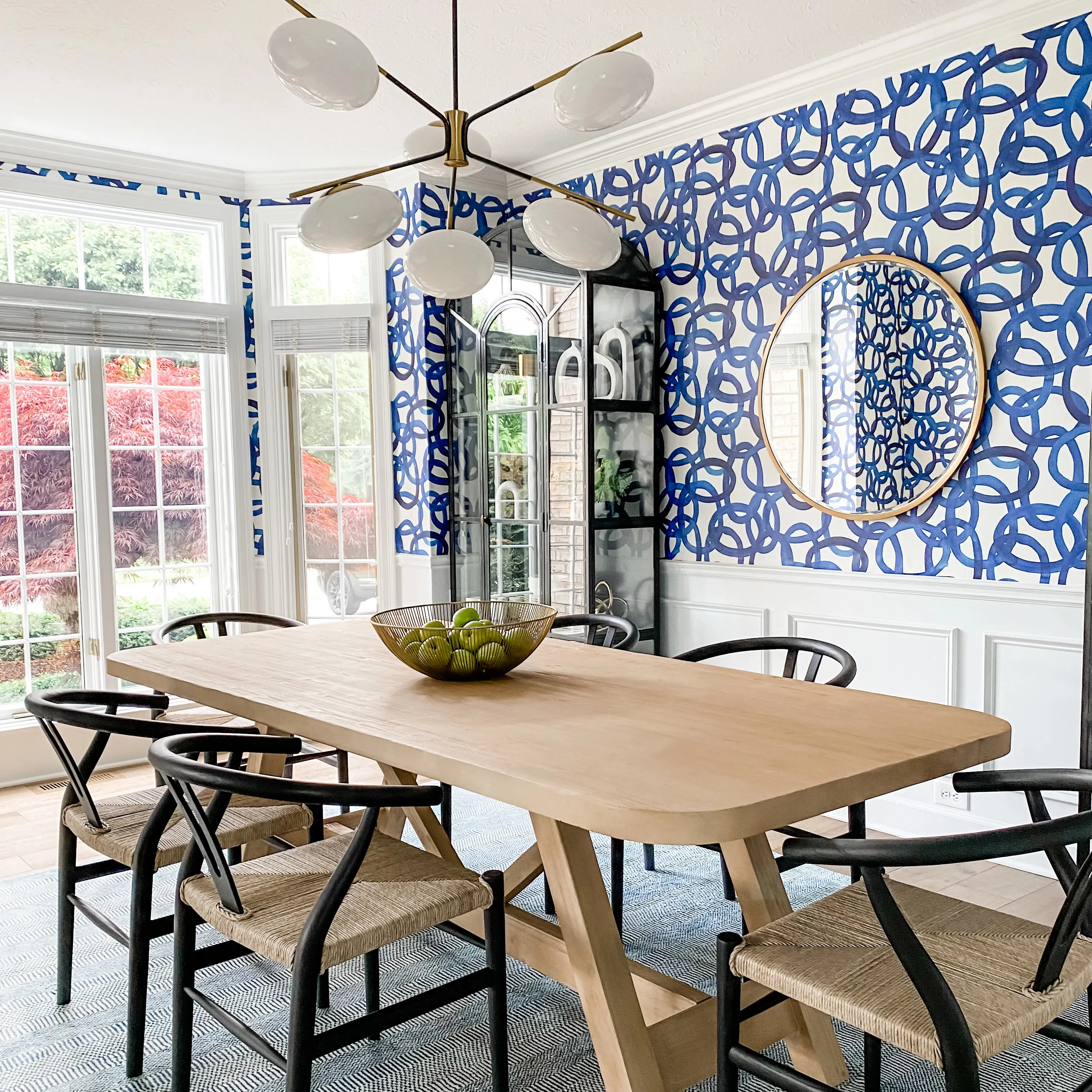 Dining room with blue circles wallpaper
