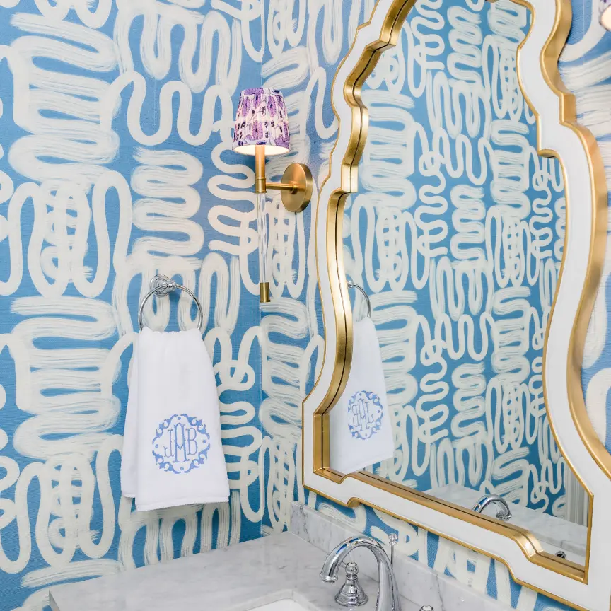 Bathroom with blue squiggle wallpaper