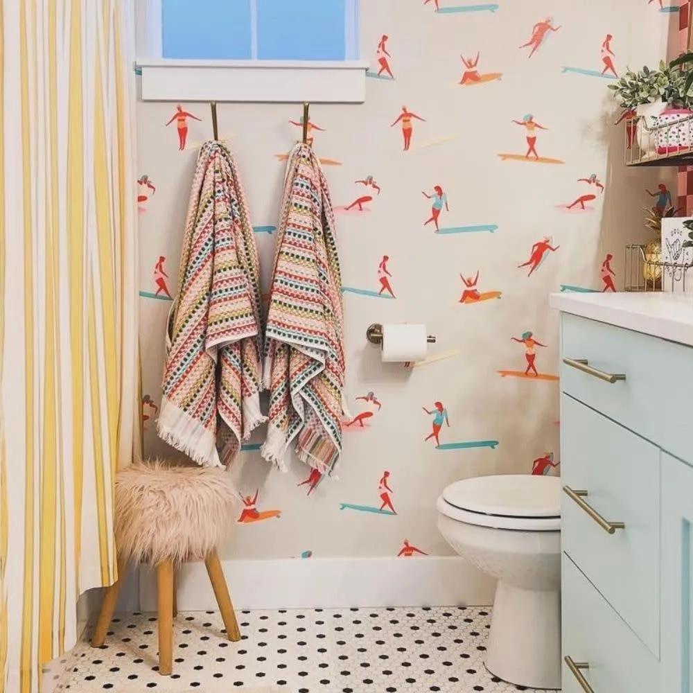 Bathroom with surfer girl wallpaper