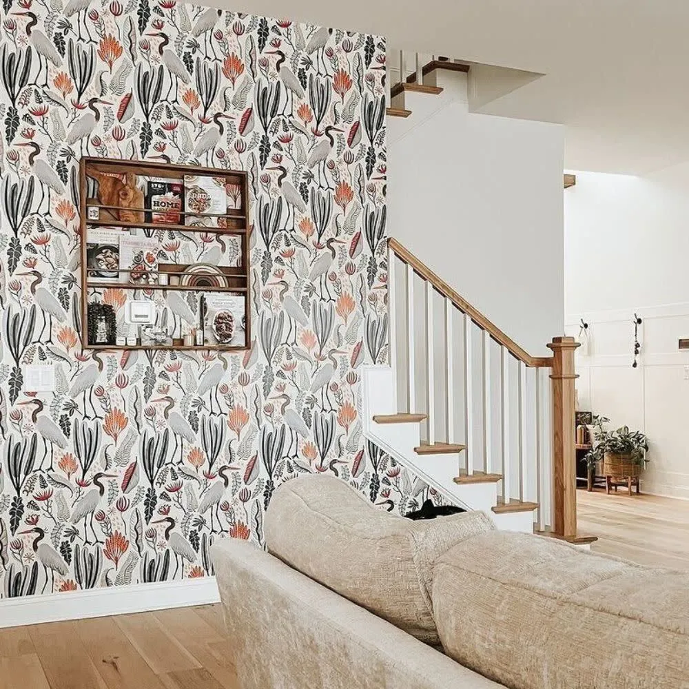 Living room with heron print wallpaper
